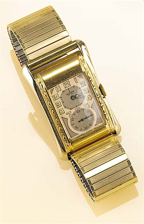 ROLEX, AN 18ct. TWO COLOUR GOLD RECTANGULAR 